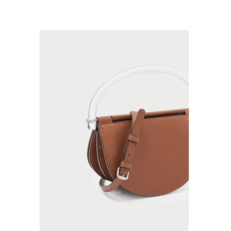

Niche design acrylic magnetic buckle transparent portable saddle bag 2019 new pure color leather shoulder diagonal bag
