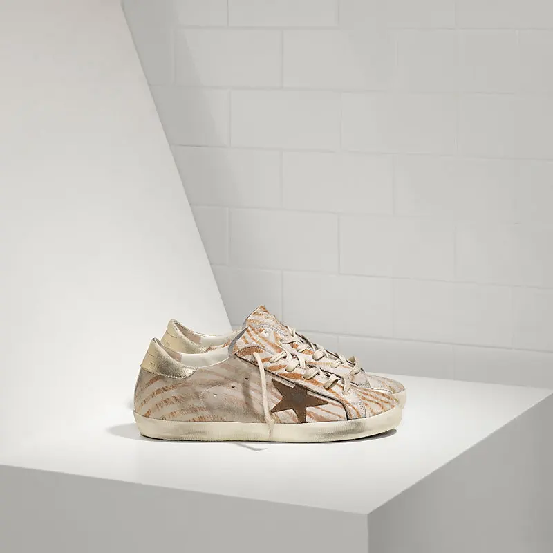 

GGDB SNEAKERS SUPER STAR IN PELLE E STELLA IN CAMOSCIO gold zebra