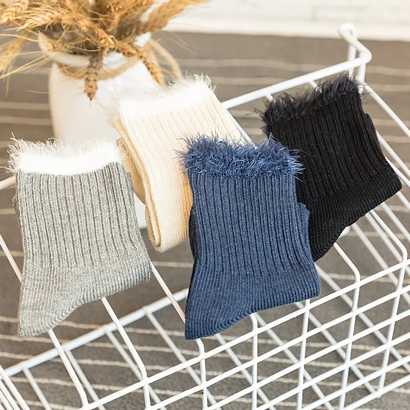 

Autumn and winter new hedgehog double needle cotton ladies tube socks solid color piled socks