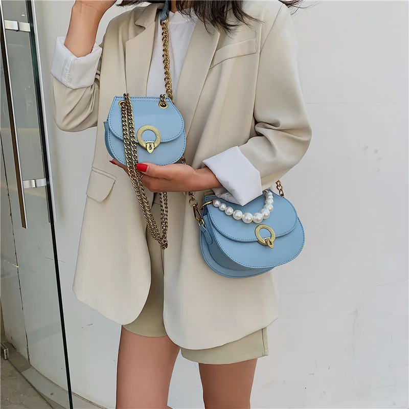 

Pearl handbag 2019 new (size) single shoulder slanting fashion pack chain saddle bag.