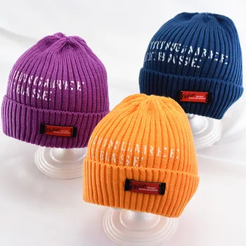 

New Baby wool knit warm hat autumn winter boys and girls solid color hat Korean children's warm padded earmuffs beanies caps