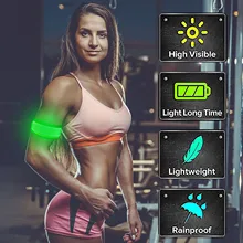 Ilumine acima as braçadeiras do diodo emissor de luz para correr a engrenagem reflexiva que pisca as pulseiras dos esportes do diodo emissor de luz
