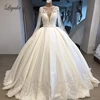 Liyuke Real Photos A Line Wedding Dress Ivory Satin Skirt Full Sleeve  Bling Bling Plearls Bridal Dress 1