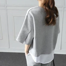 two-piece suit 2020 spring leisure O-collar fake two-piece top 3/4 trousers two-piece wide loose loose-sleeved cotton jacket two-piece suit 2020 spring leisure O-collar fake two-piece top 3/4 trousers two-piece wide loose loose-sleeved cotton jacket