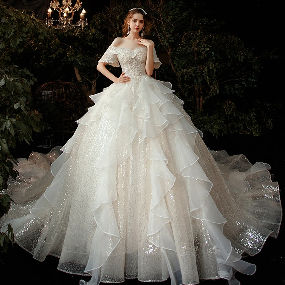 2021 New Arrivals Straplss Short Sleeve Lace Up Back Beaded Sequined Flowers Super Sparkly Ball Gown Wedding Dress Robe Mariée