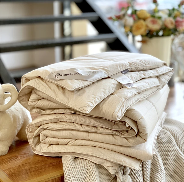 Experience pure comfort and luxury with the 100% Merino Wool Filling Comforter