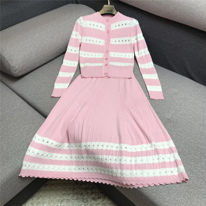 

Set female 2019 autumn new striped knit openwork top + striped skirt two-piece suit