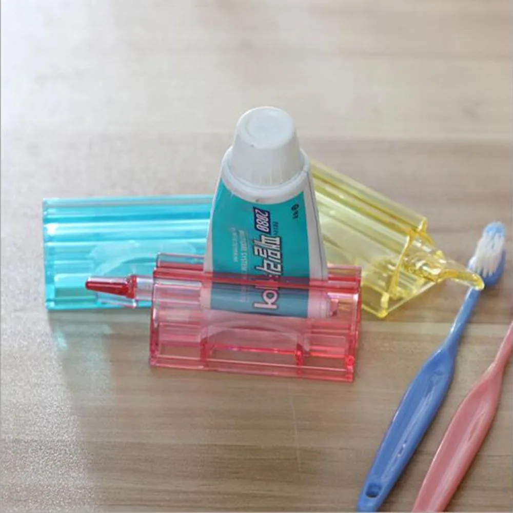 hot New Rolling Tube Tooth Paste Squeezer Dispenser Toothpaste Dispenser Holder Bathroom Stand