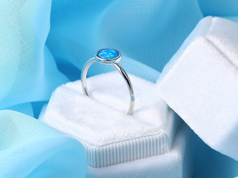 ZHOUYANG Opal Stone Rings For Women Simple Classic Round White Gold Color Party Birthday Gift For Girls Fashion Jeweley DZR032 ZHOUYANG Opal Stone Rings For Women Simple Classic Round White Gold Color Party Birthday Gift For Girls Fashion Jeweley DZR032