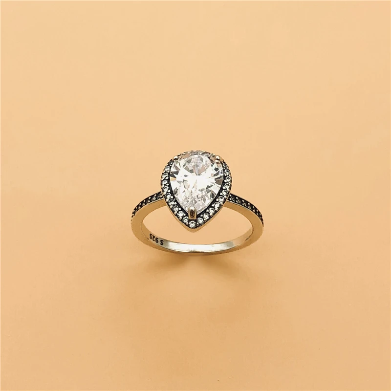 

Cefuny 925 Sterling Silver Sparkling Teardrop Halo Ring Radiant Ring with Cubic Zirconia Women Jewelry Collection Wholesale