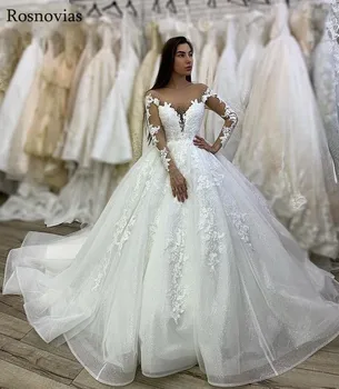 

Ball Gown Princess Wedding Dresses 2019 Sheer Neck Long Sleeves Covered Button Back Lace Appliques Beaded Chapel Bridal Gowns