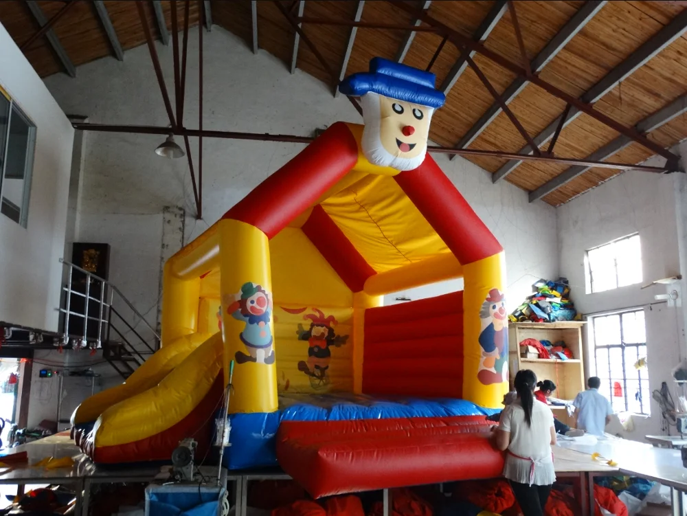 

Cartoon design inflatable bounce house with slide