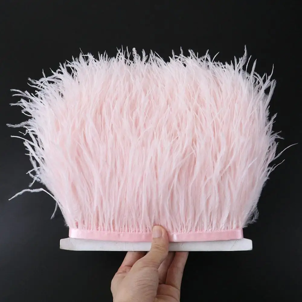 

Румяна розовая страусиное перо отделка бахрома с атласной лентой