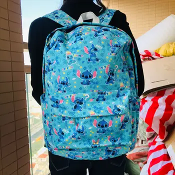 

New Star Baby Lilo Stitch Cartoon Canvas Backpack Travel Plush Weight: 450g Material: Canvas Size: 15*29*40cm Kitty Bag