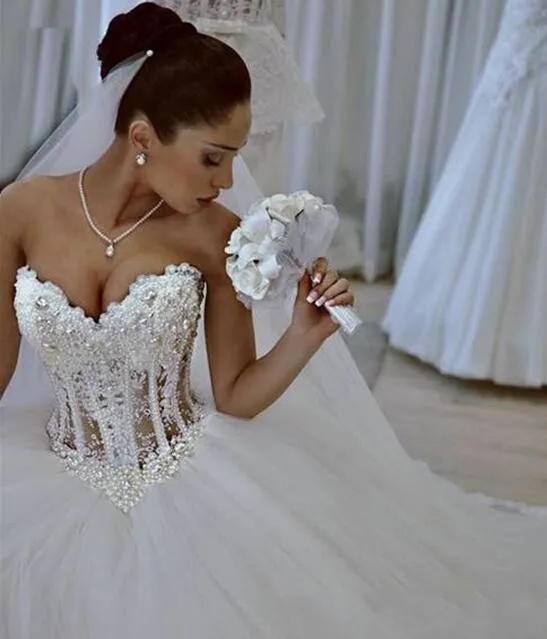 luxury-wedding-dresses-with-lace-pearl-beads-unique-arabic-bridal-gowns-sweetheart-neck-zip-back-white-tulle-princess-wedding-gowns (2)