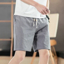 Новые хлопковые шорты для мужчин, повседневные пляжные шорты для мужчин, качественные шорты с эластичной резинкой на талии, модные однотонные пляжные шорты размера плюс 5XL