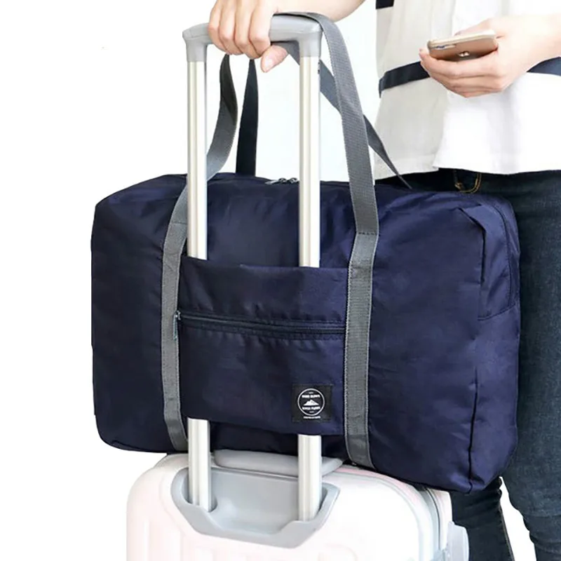 

2018 new nylon foldable travel bag unisex Large Capacity Bag Luggage Women WaterProof Handbags men travel bags Free Shipping
