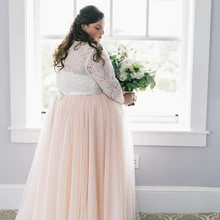 long sleeve blush wedding dress