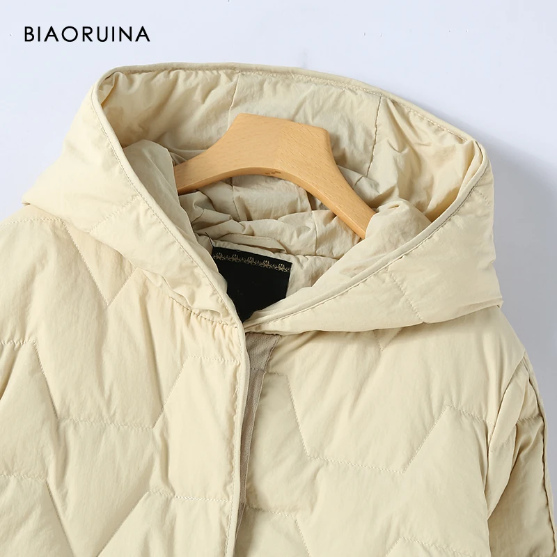 BIAORUINA, женская модная зимняя длинная однотонная стеганая куртка, Женская Повседневная универсальная теплая пуховая куртка с капюшоном и поясом, приталенный крой