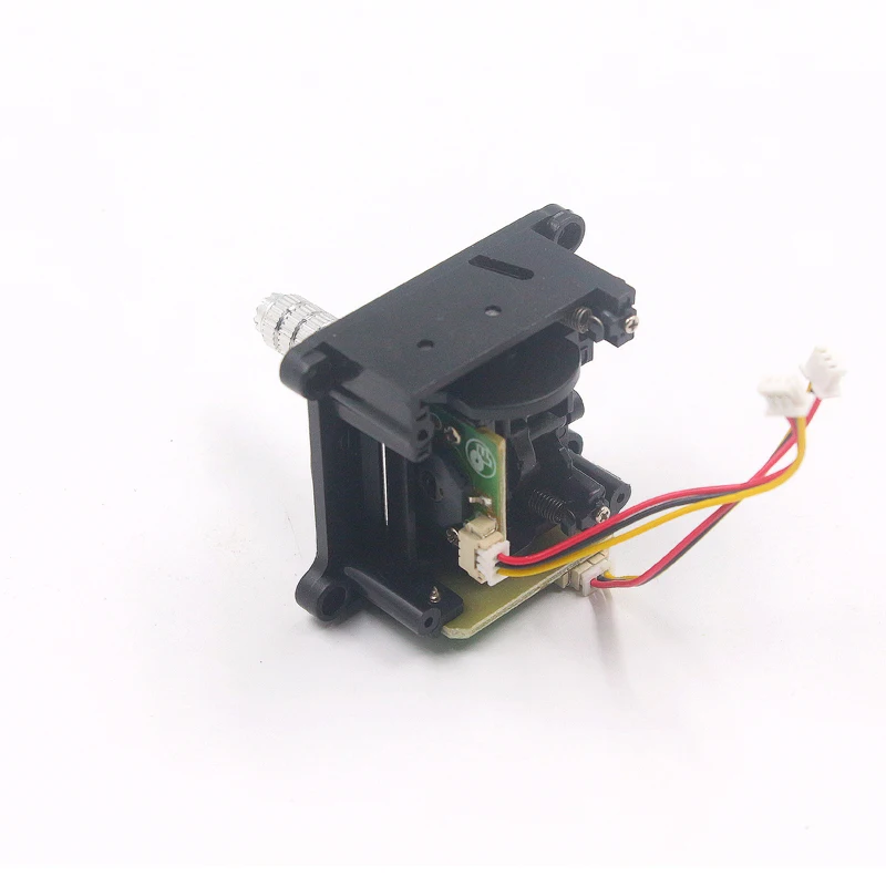 Drone télécommandé posé sur une surface, montrant les trois options de couleur : noir, blanc et rouge - Acheter Mini Drone Télécommandé Pas Cher