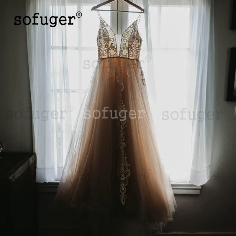 Bohe Чемпион свадебное платье Кружева аппликации V образным вырезом Robe De Mariee Sofuge Дубай Арабский Abiti Da Sposa без рукавов