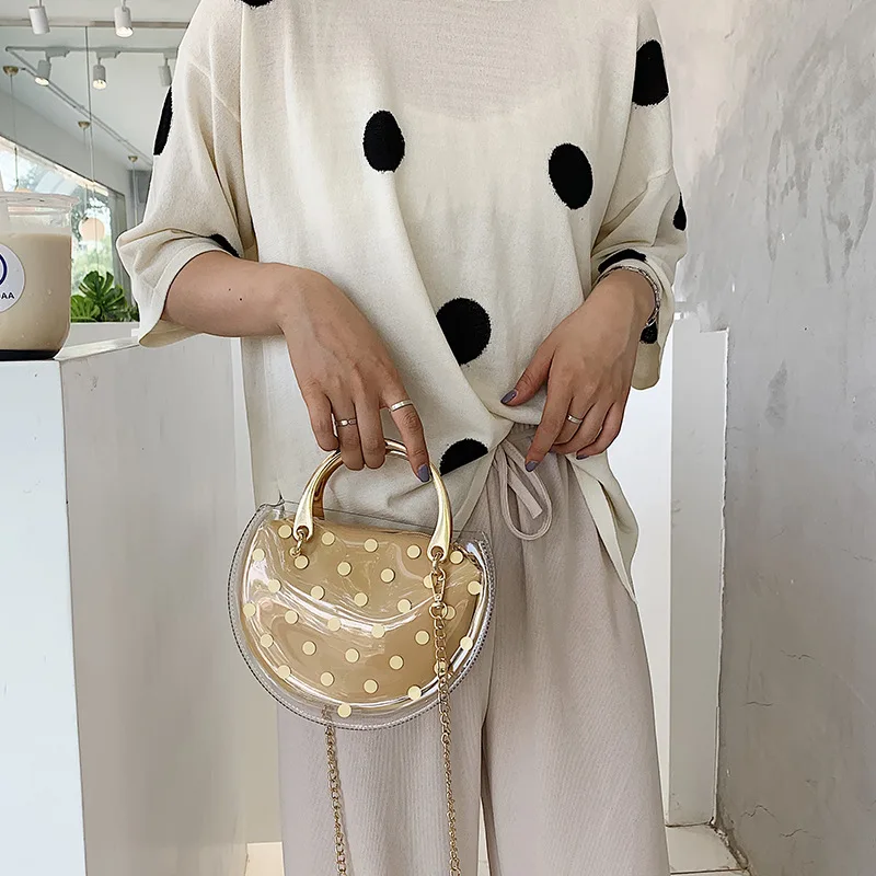 

Last summer the little fresh jelly bag 2019 semi-circular transparent polka dot portable small bag girl shoulder Messenger bag
