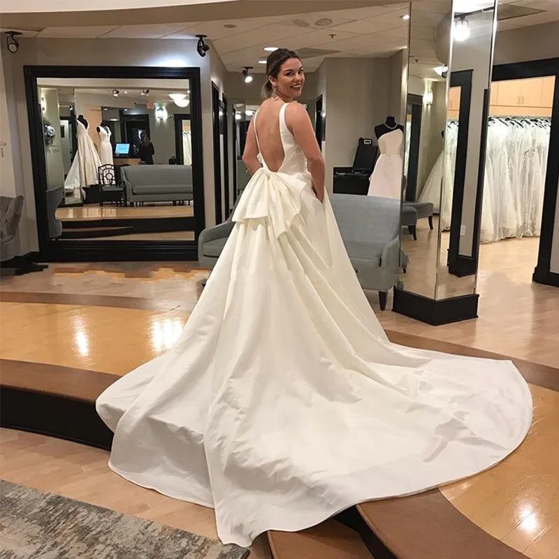 E-JUE-SHUNG-Latest-Satin-Wedding-Dresses-Deep-V-Neck-Open-Back-With-Pockets-Big-Bow (1)