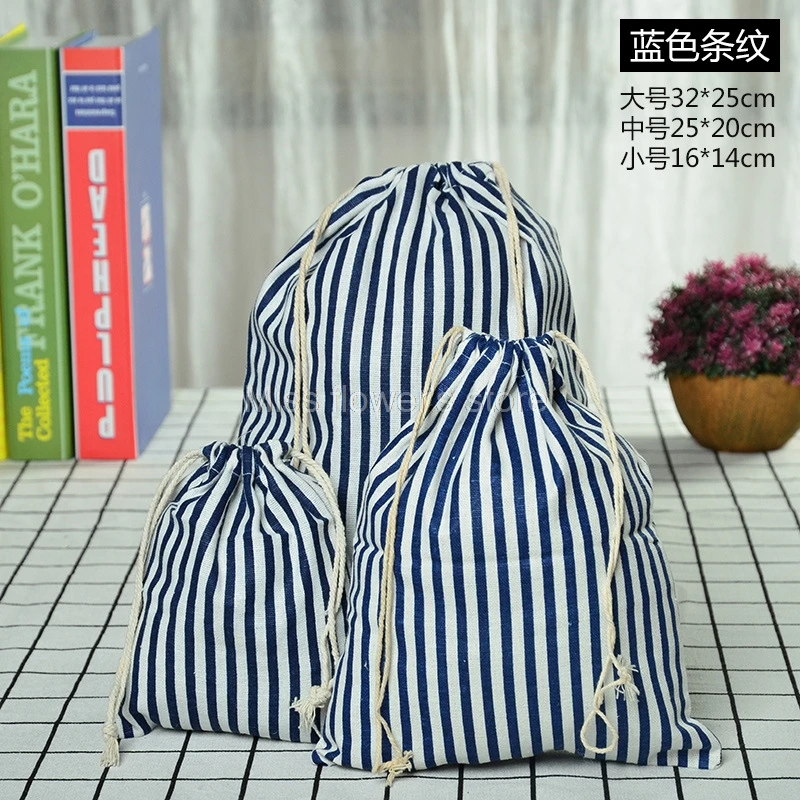 thumbnail image 1 of Bolsillo de lino y algodón estampado con cordón para guardar caramelos, diseño de rayas 60-63, 1 of 5