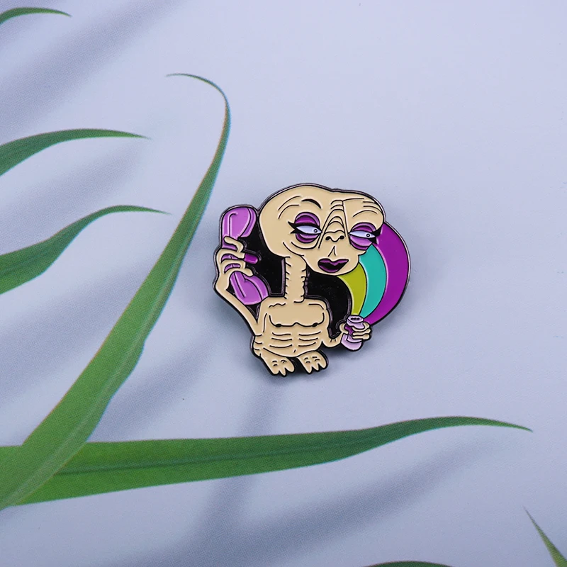 

Skeleton aliens calling enamel pin halloween ghost pin