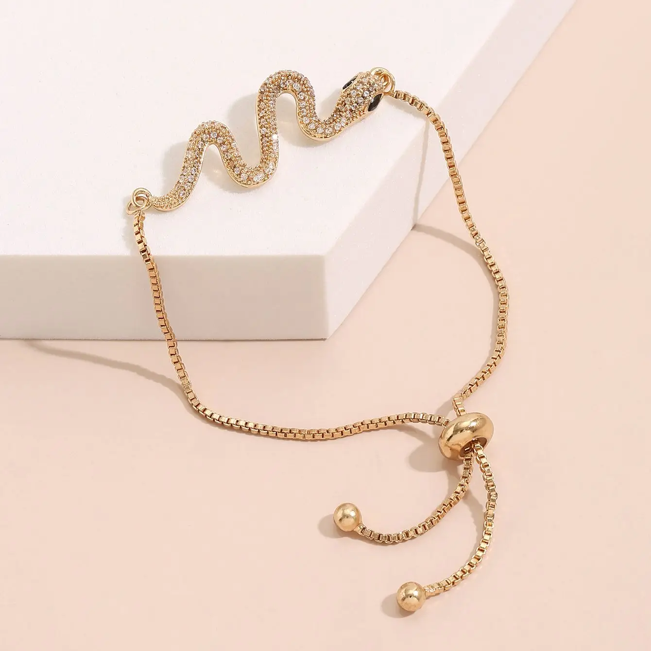 

Fashionable and popular copper inlaid zircon golden snake shape ins style pull zircon bracelet for ladies