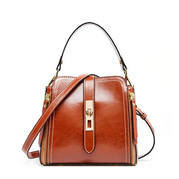 

SUPER SPACE Summer leather bag 2020 new leather casual shoulder messenger bag bucket bag portable female bag