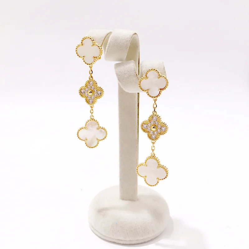 

Fashion accessories beautiful copper earrings four-leaf clover inlaid white mother-of-pearl earrings personality to send new hot