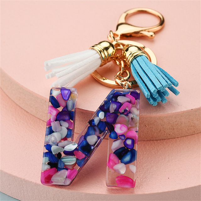 Women Keychains 26 Glitter Hollowed-out Words Handbag Tassel English Letter Keyring with Puffer Ball Charms Free Shipping
