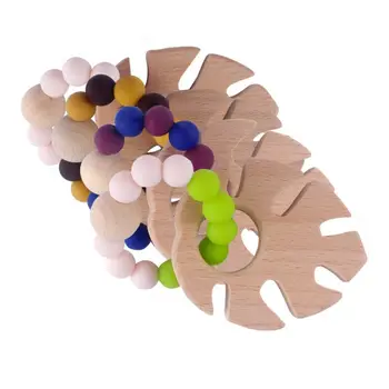 

Baby Teether Wooden Bracelets Silicone Beaded Newborn Infants Teething Nursing Molar Toys Gift 63HE