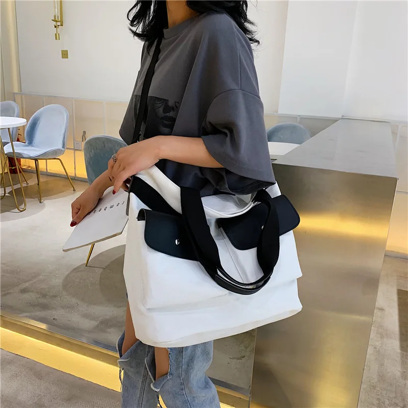 

2019 new tide large capacity canvas bag double pocket Joker hand bill of lading shoulder messenger bag tote bag