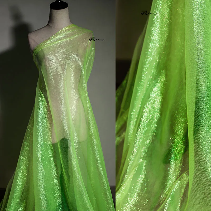 

Creative Light Yellow Blue Silver Designer Fabric Laser Magic Color Soft Organza Seven Color Dress Wedding Mesh Fabric