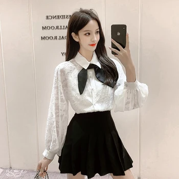 

COIGARSAM French Style Full Shirt Womens tops New Spring Loose Lantern Sleeve Belt Women shirts White 6801