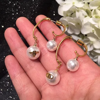 

Korean fashion retro baroque irregular bee earrings front and back double-sided pearl earrings sweet temperament