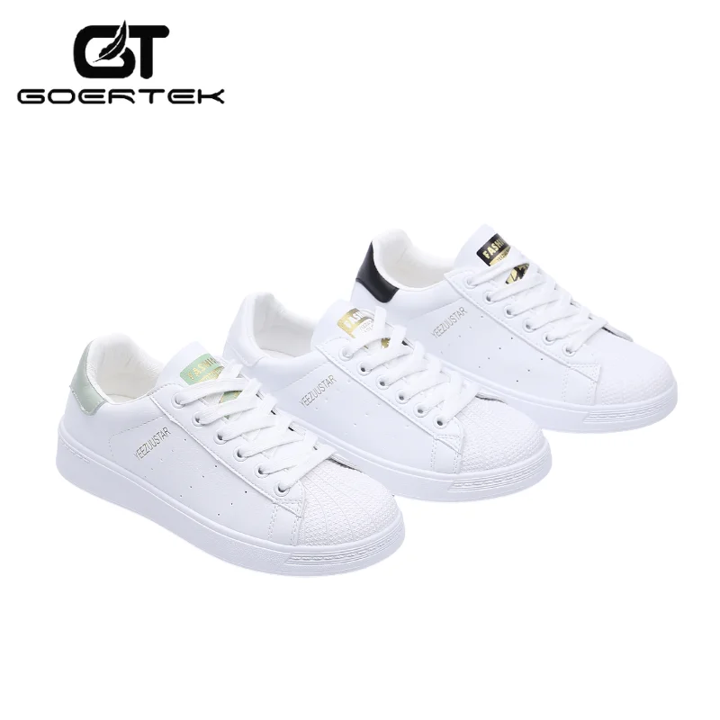 white flat tennis shoes