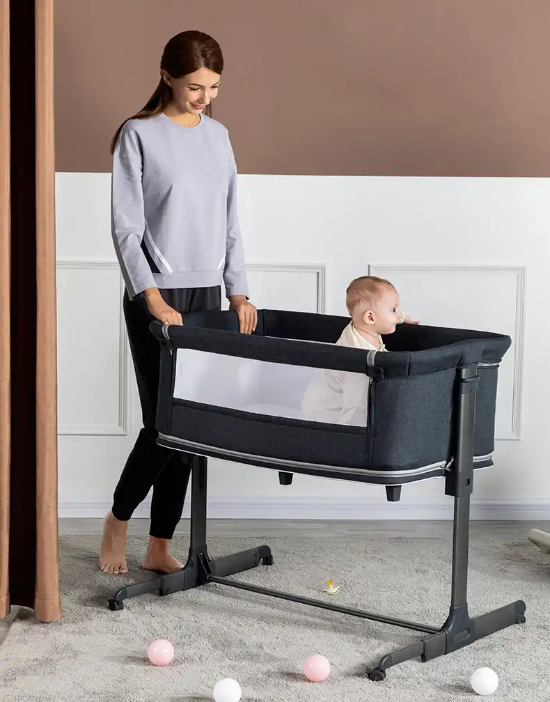 crib connected to bed