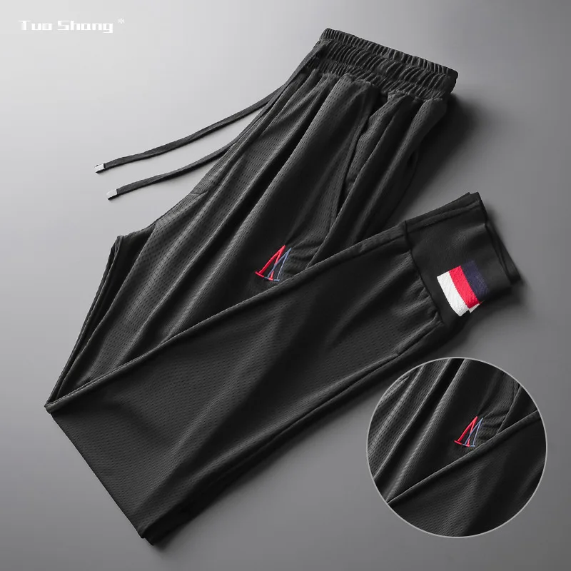 Autumn Black Hollow Out Mens Pants Loose Drawstring Sports Pants Streetwear Fashion Designer Joggers Calca Masculina