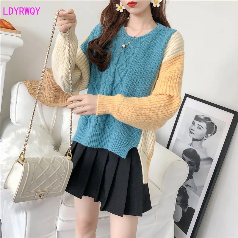 

2019 autumn and winter new Korean women's net red head round neck lantern sleeves twist color loose lazy wind knit sweater