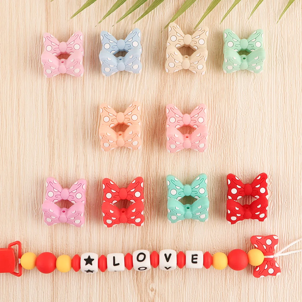 

Kovict 10pcs Baby Silicone Beads New Bow Tie Beads BowKnot Beads Teether Baby Toys DIY Pacifier Chain Necklace Accessories
