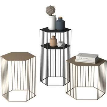 

The geometric corner of the iron-art tea table is a few creative tables. The simple modern gold sofa is a few high.