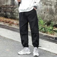 Красивые мужские брюки с несколькими карманами, Мужские штаны с эластичной талией, шаровары в стиле хип-хоп, повседневные свободные мужские штаны для бега