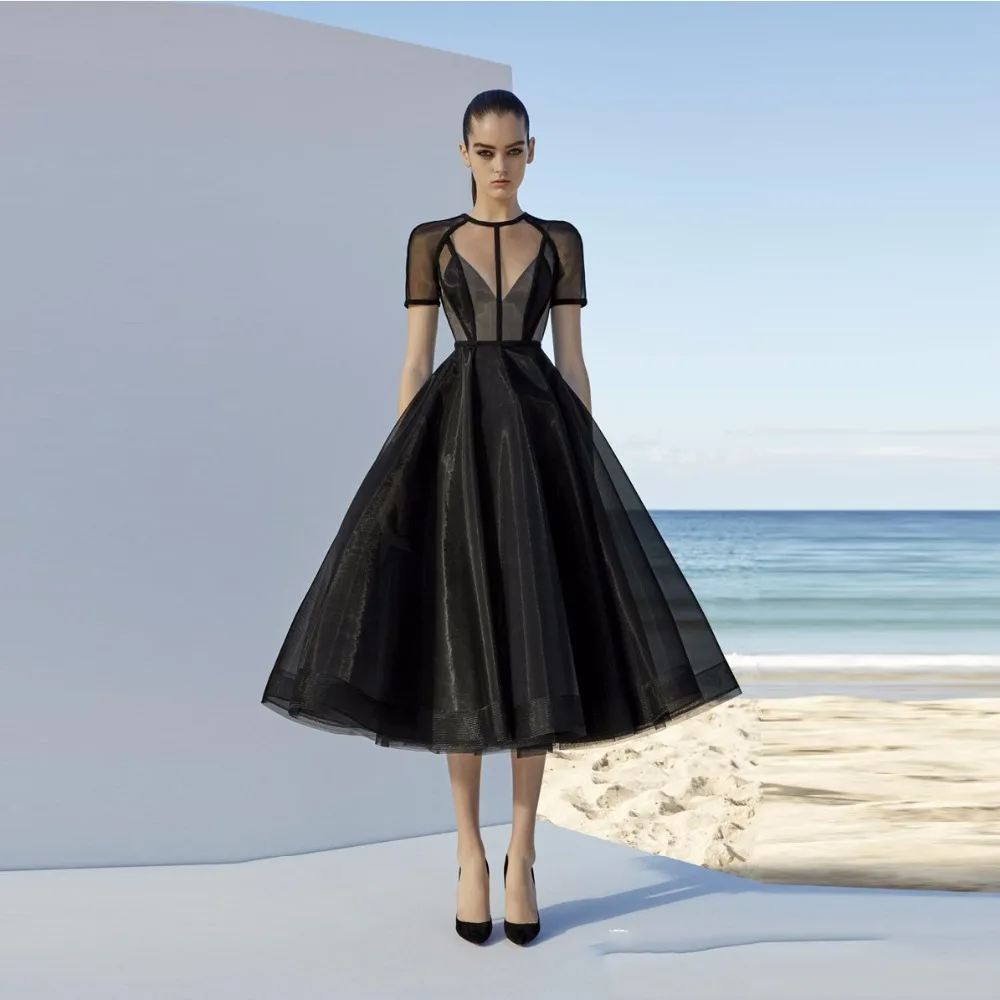 black long sleeve tea length dress