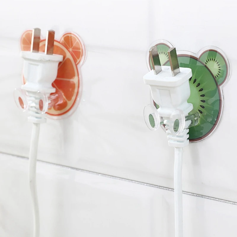 

1PC Home Wire plugs Adhesive Hanger Home Office Storage RacksFruit Shaped Wall Storage Hook Power Plug Socket Holder