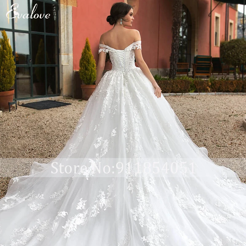 EVALOVE Gorgeous Appliques Royal Train A-Line Wedding Dress Sweetheart Neck Lace Up Beading Sparkly Tulle Princess Bridal Gown vintage wedding dresses