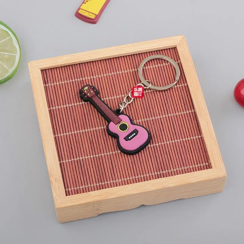 Мягкий резиновый брелок для музыкального инструмента