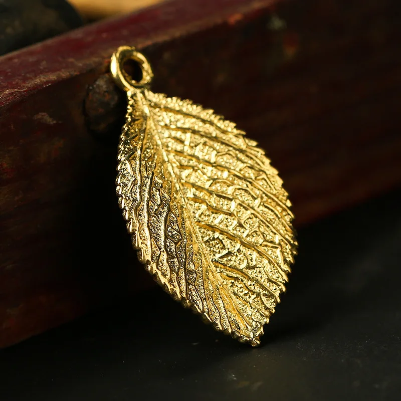 gold leaf charms (6)